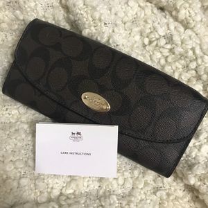 coach wallet brown gold accent